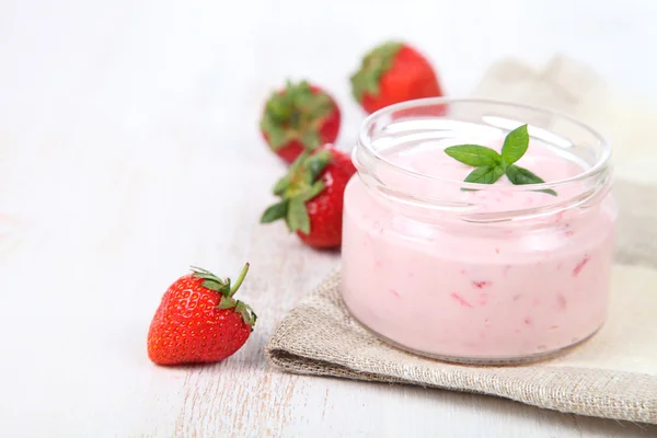 Strawberry yogurt and ripe strawberry