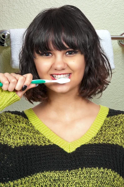 Beautiful Woman Brushing Teeth