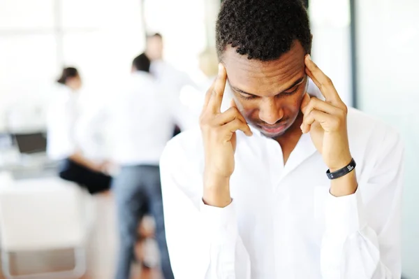 Businessman stressed in office