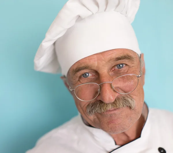 Elderly chef in uniform