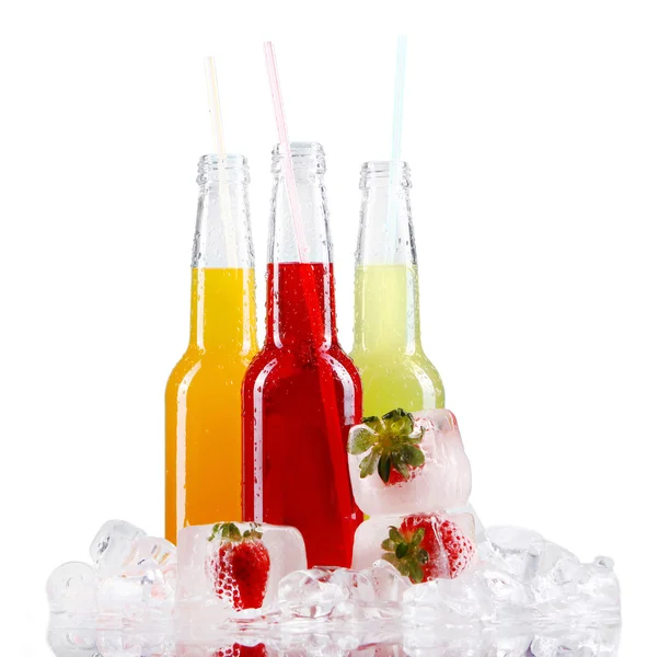 Bottles with colorful drinks