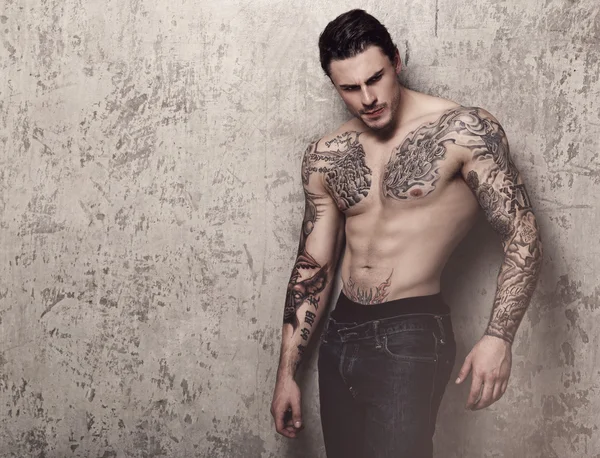 Tattooed man with perfect body