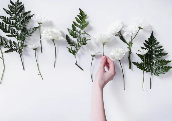 Woman making a flower bouquet