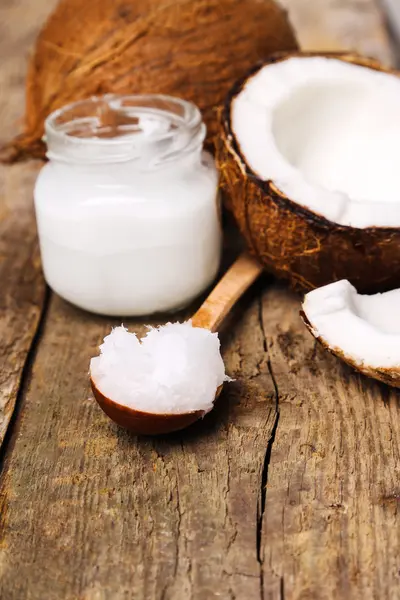 Coconut and oil on the table