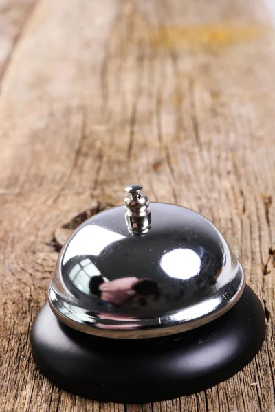 Metallic Ring bell on table