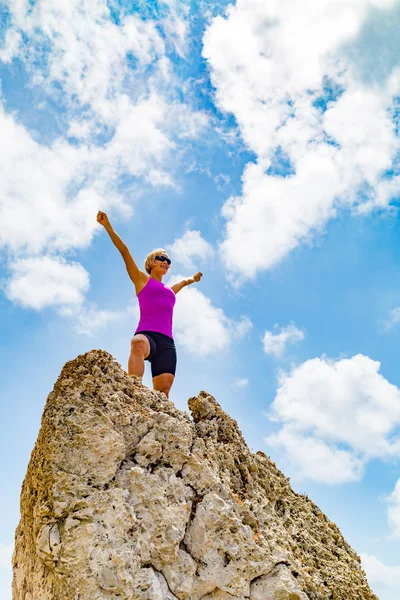 Happy trail runner winner reaching life goal success woman