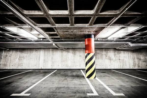 Concrete wall underground parking garage interior