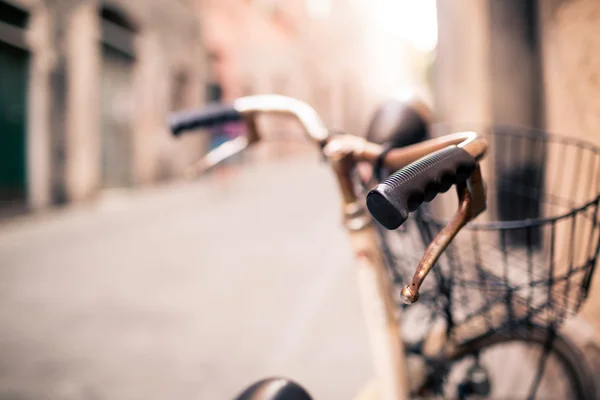 City bicycle handlebar, bike over blurred beautiful bokeh backgr
