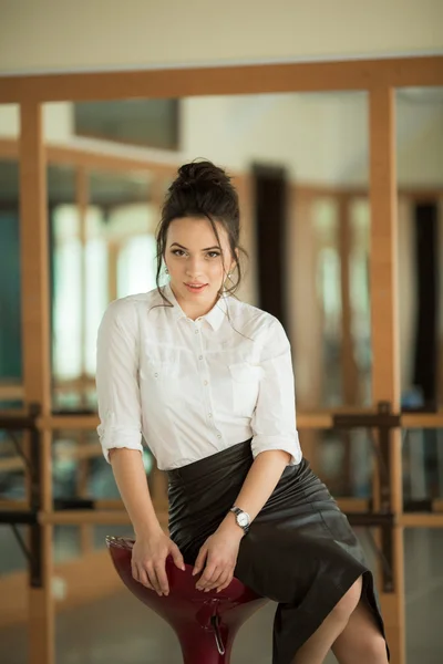 Fashion woman sitting on chair