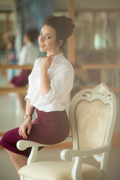 Fashion woman sitting on chair