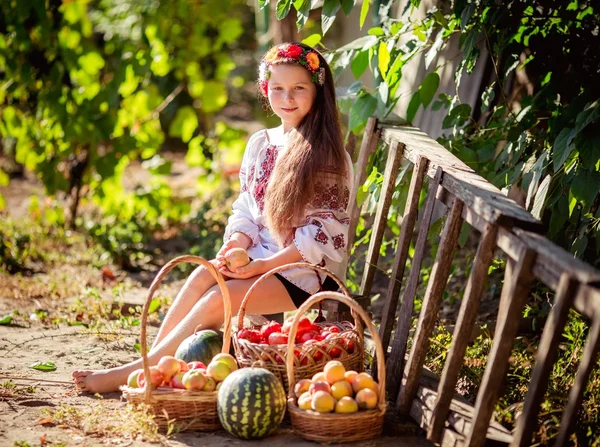 Ukrainian girl with fruits and vegetables