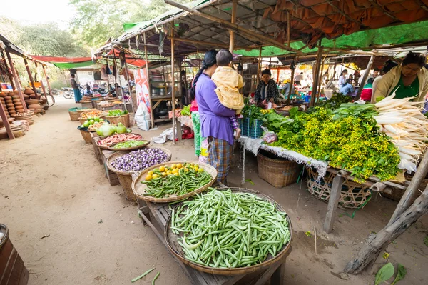 People shopping at asian market.