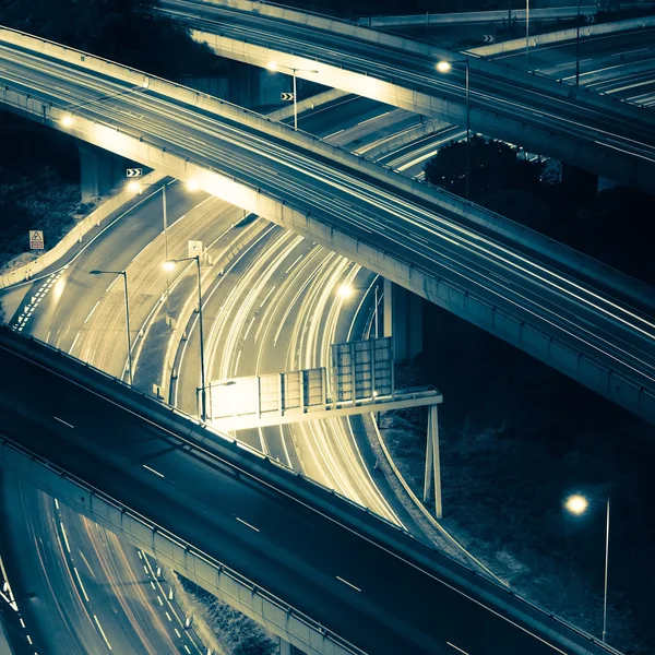 Abstract night view of highway interchange. Hong Kong city in vi