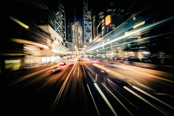 Modern city motion blur. Hong Kong. Abstract cityscape traffic