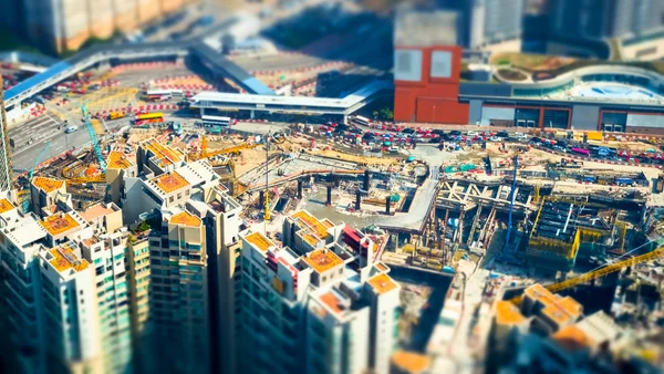 Aerial cityscape view with building construction. Hong Kong. Tilt shift