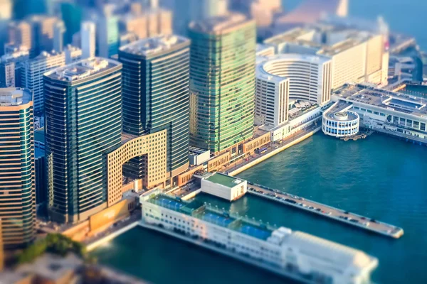 Tilt shift effect. Aerial view of Hong Kong Island with port