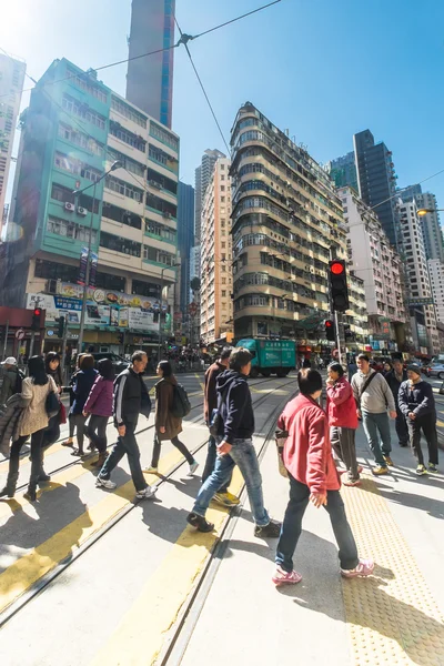 People walking at crowded streets. Hong Kong