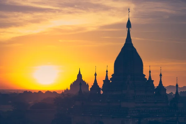 Ancient Buddhist Temples of Bagan Kingdom at sunrise. Myanmar (B