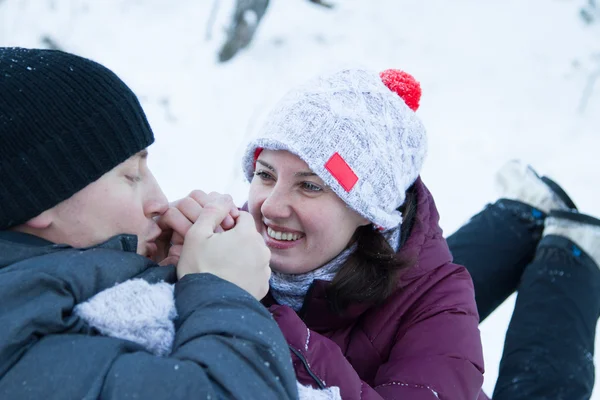 Man in love warm frozen hands to his girlfriend