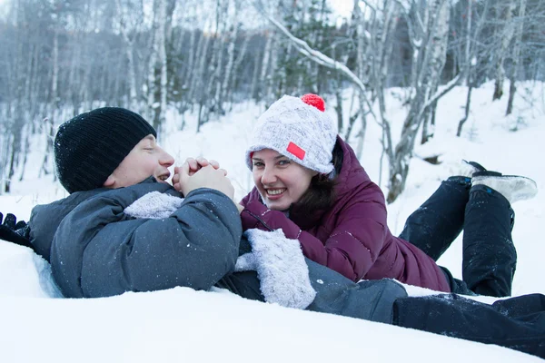 Man in love warm frozen hands to his girlfriend