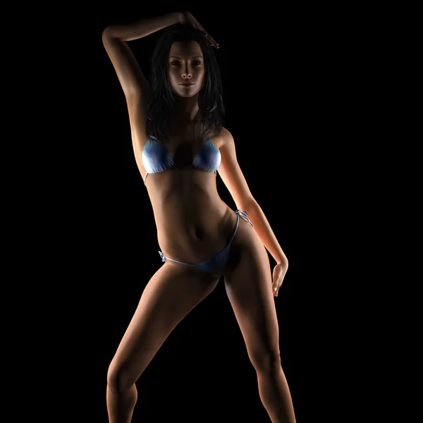 Sexy brunette bikini woman posing in dark studio