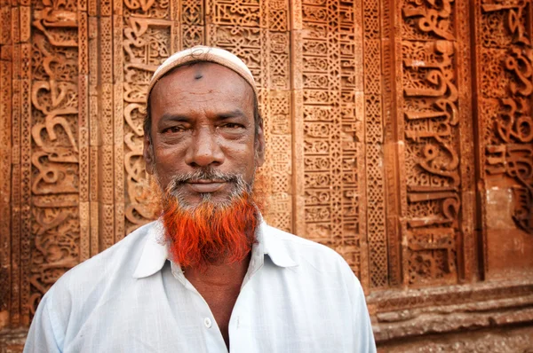 AJMER, INDIA - APRIL 06, 2013: Undefined indian man with red beard in front of Adhai-din-ka-Jhonpra