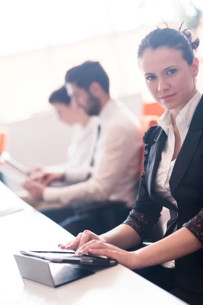 Business woman on meeting  using tablet