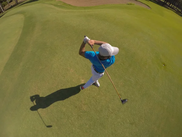 Top view of golf player hitting shot