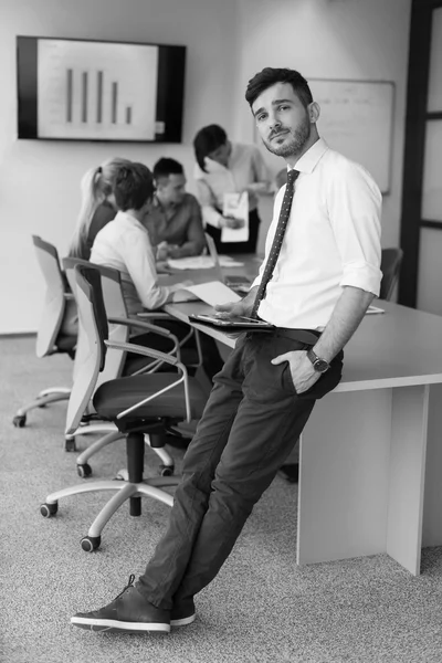 Young business man with tablet at office meeting room