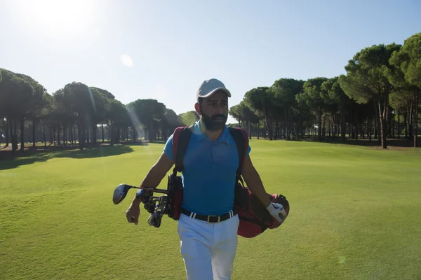 Golf player walking