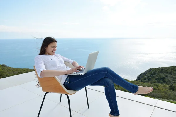 Woman working on laptop