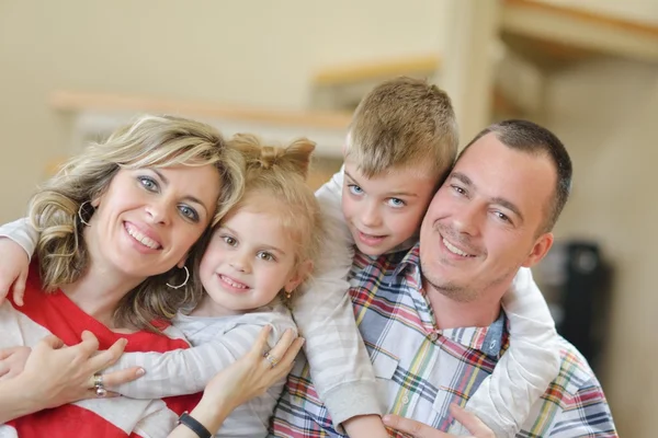 Happy young family at home