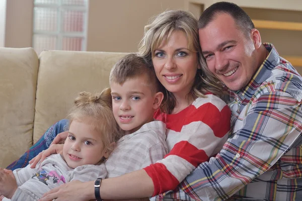 Happy young family at home