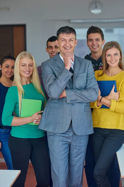 Group portrait of teacher with students