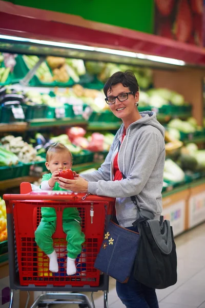 Mother with baby in shopping mall