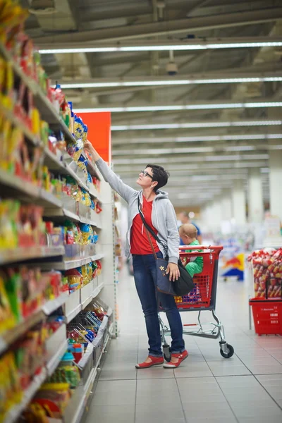 Mother with baby shopping