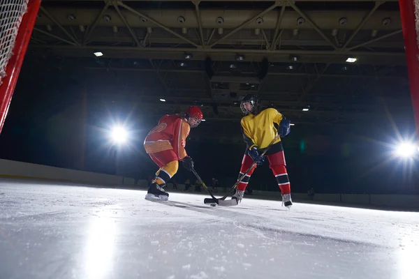 Teen ice hockey sport  players in action