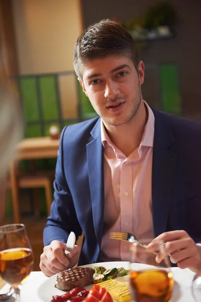 Business couple having dinner