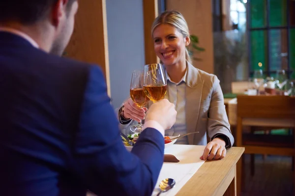 Business couple having dinner