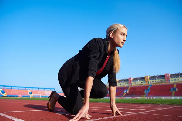 Business woman ready to sprint