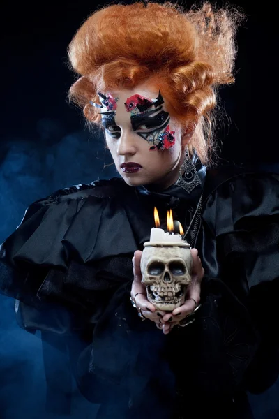 Picture a beautiful fantasy woman with skull. Halloween theme.