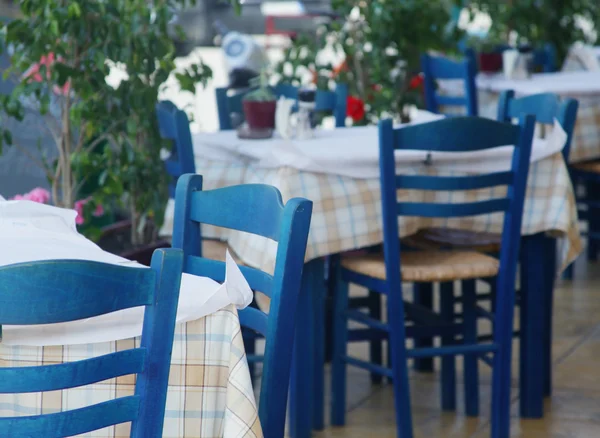 Blue chairs on a greek cafe on Zakinthos