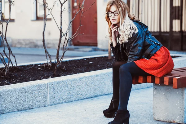 Girl Sitting on Bench