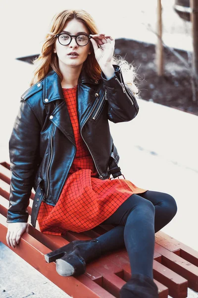 Girl Sitting on Bench