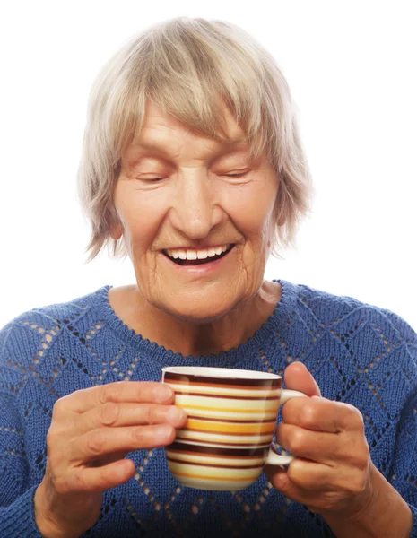 Happy old lady with coffee