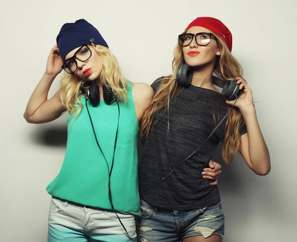 Two young hipster girls best friends