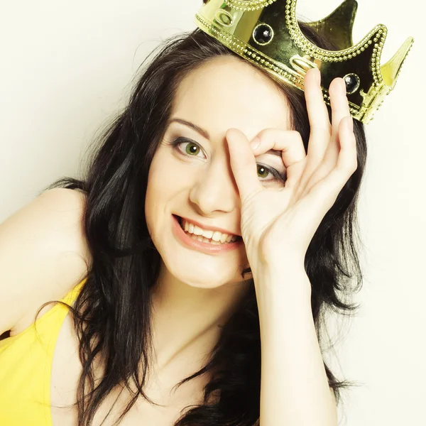 Young lovely woman with crown