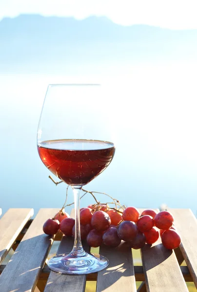 Red wine against Geneva lake