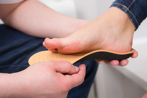 Close up pedicure process - at podiatry salon