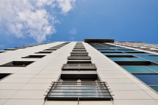 High-rise house on blue sky background